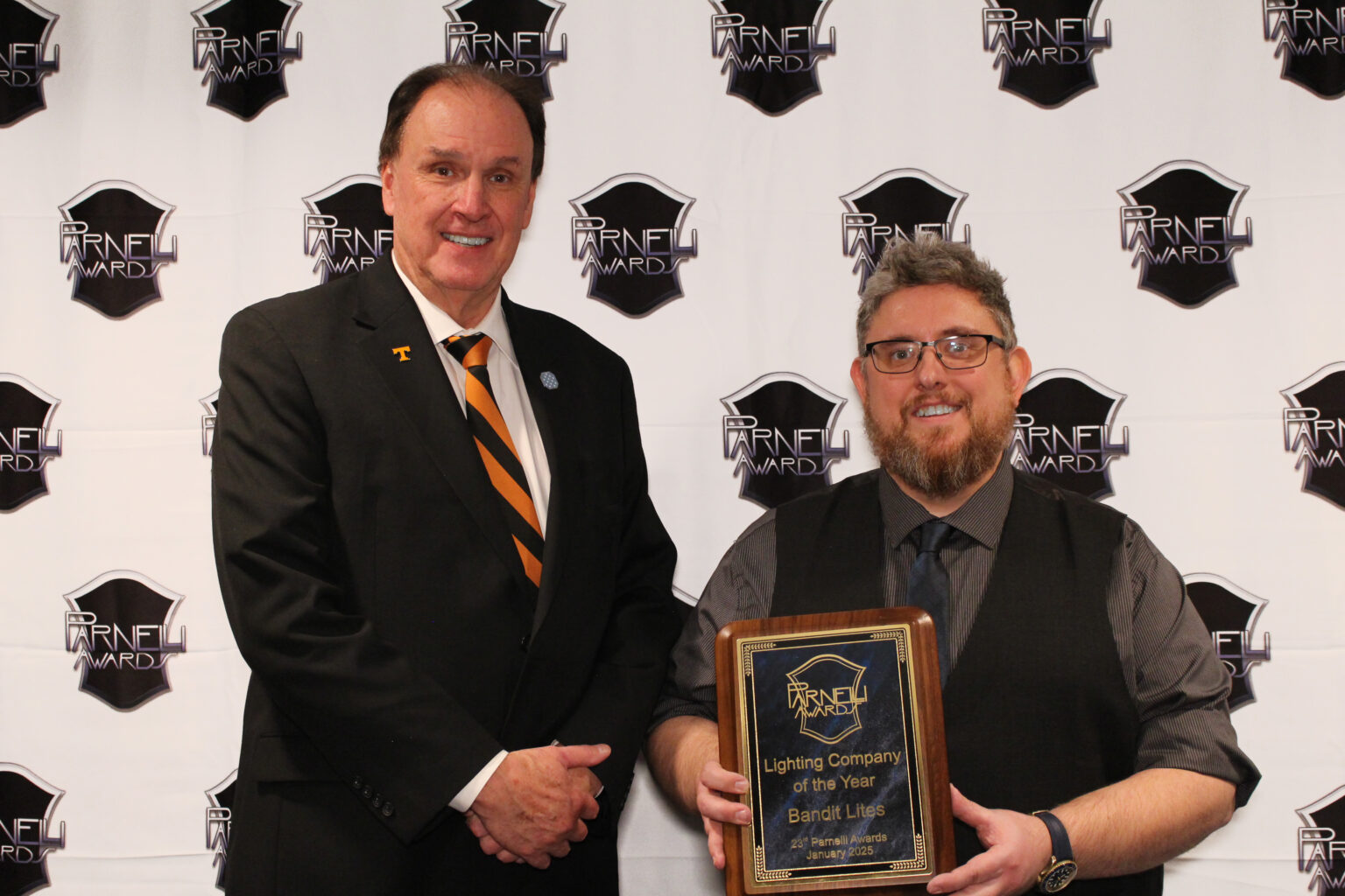 Bandit Chair and Founder, Michael T. Strickland with Client Representative Mike Stanley. Photo by Kathleen Eddy